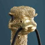 Wall Lamp Ostrich Gold, illuminated view