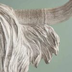 Wall Lamp Bison Gray, shown mounted in a living room