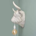Wall Lamp Bison Gray, illuminated view showing the visible bulb