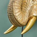 Wall Lamp Elephant Gold, illuminated view showing the visible bulb