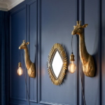 Wall Lamp Giraffe Gold Small, shown mounted in a living room