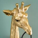 Wall Lamp Giraffe Gold Small, close-up detail of the gold finish