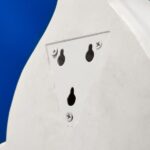 Wall Lamp Shark White, shown mounted in a living room