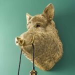 Wall Lamp Wild Boar Gold, illuminated view