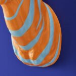 Wall Lamp Zebra Blue and Orange, close-up detail of the hand-painted finish